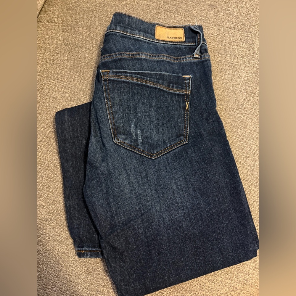 Almost brand new Express barely boot jeans , mid rise, size 6R, & very stretchy!